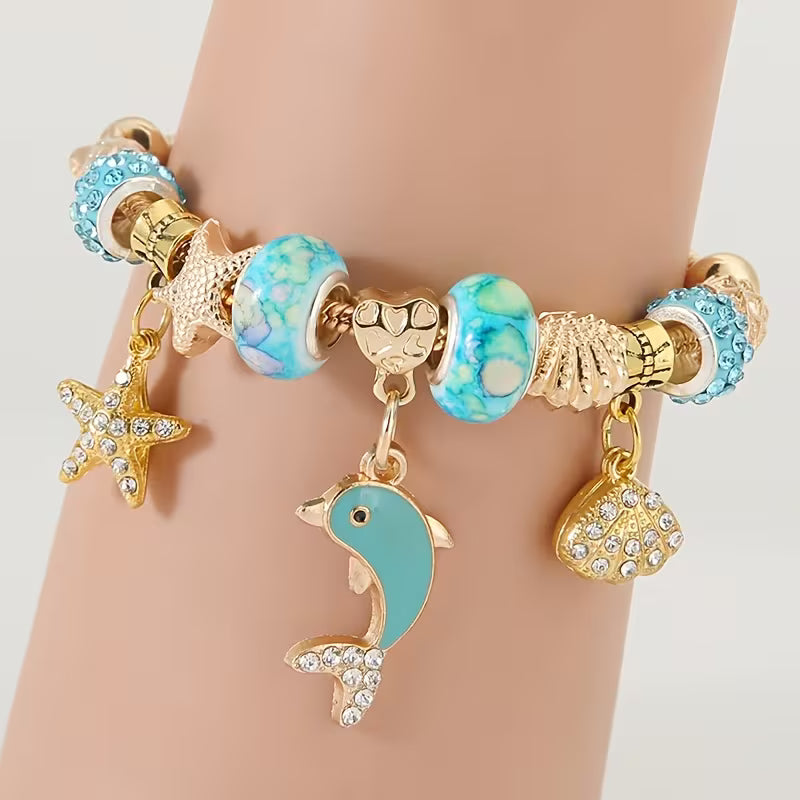 Bracelet Ocean Treasure – Câble en acier 304L avec breloques marines