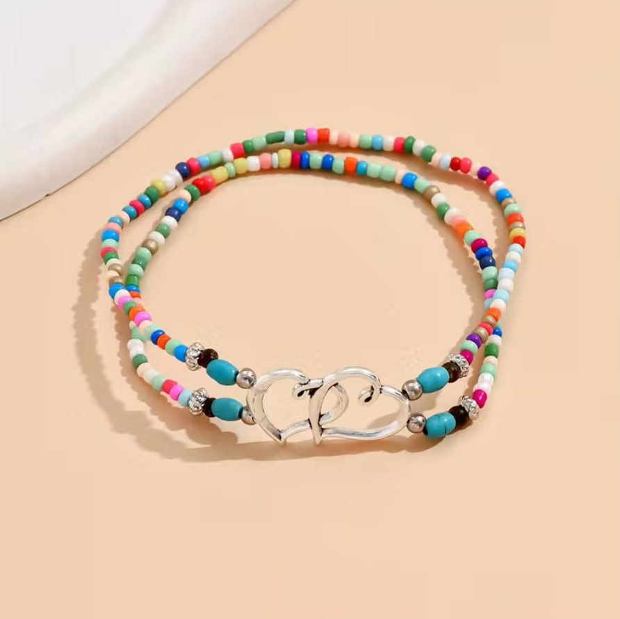 Tornozeleira Dupla de Miçangas Coloridas com Pendente Coração – Estilo e Durabilidade