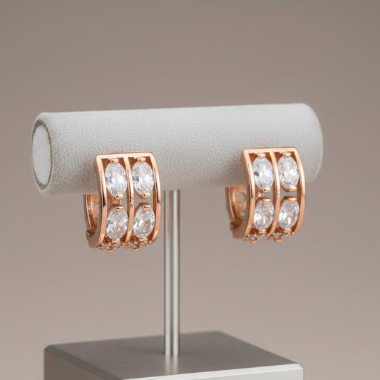 Créoles en or laminé rose 14 carats avec zircons