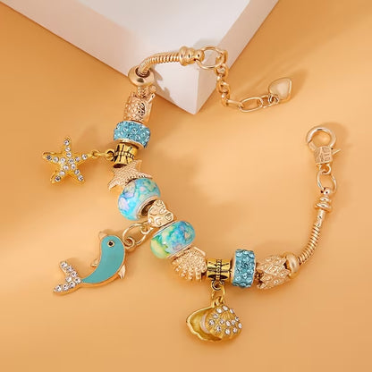 Bracelet Ocean Treasure – Câble en acier 304L avec breloques marines