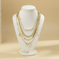 Collier pour femme en acier inoxydable, 4 rangs de perles