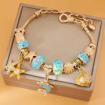 Bracelet Ocean Treasure – Câble en acier 304L avec breloques marines