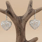 Estes brincos pendentes combinam a inconfundível forma Open Heart com a qualidade superior da prata Tiffany.