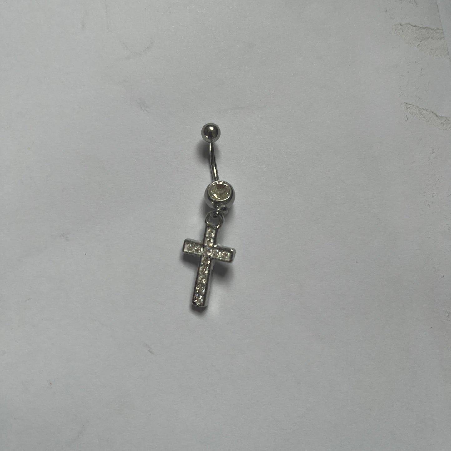 Piercing de umbigo em aço inoxidável com Cruz