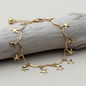 Pulseira de Tornozelo em Aço Inoxidável Dourado – Estrelas do Mar Ajustável