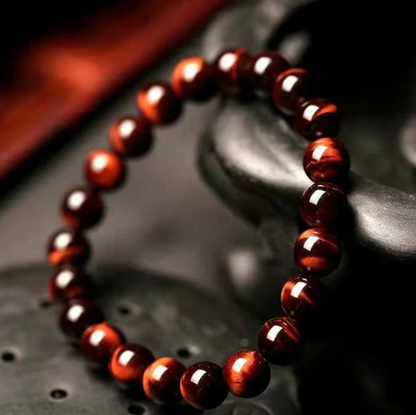 Pulseira Olho de Tigre Vermelho – Energia, Paixão e Proteção