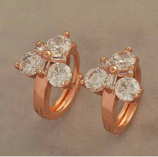 Petites créoles en or rose laminé 10K avec zircons