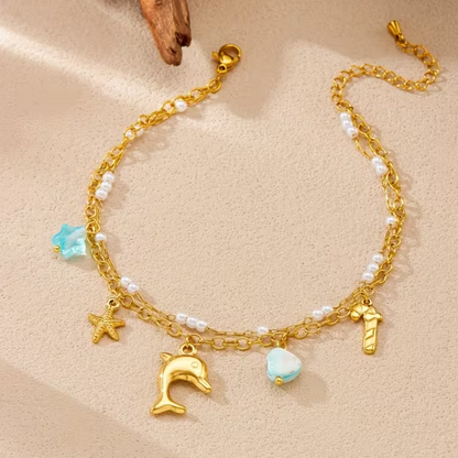 Pulseira Tornozelo  Dolphin & Shell Charm – Coleção Mar e Vida