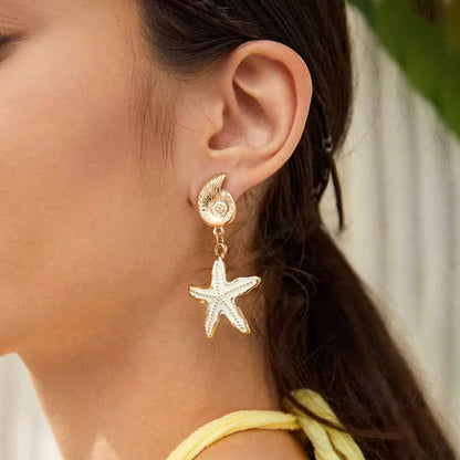 Brinco de Senhora em Aço Inoxidável, Concha com Estrela do Mar Caída