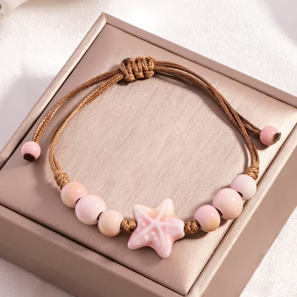 Pulseira Ajustável com Estrela-do-Mar Rosa – Estilo Boho | Mar e Vida