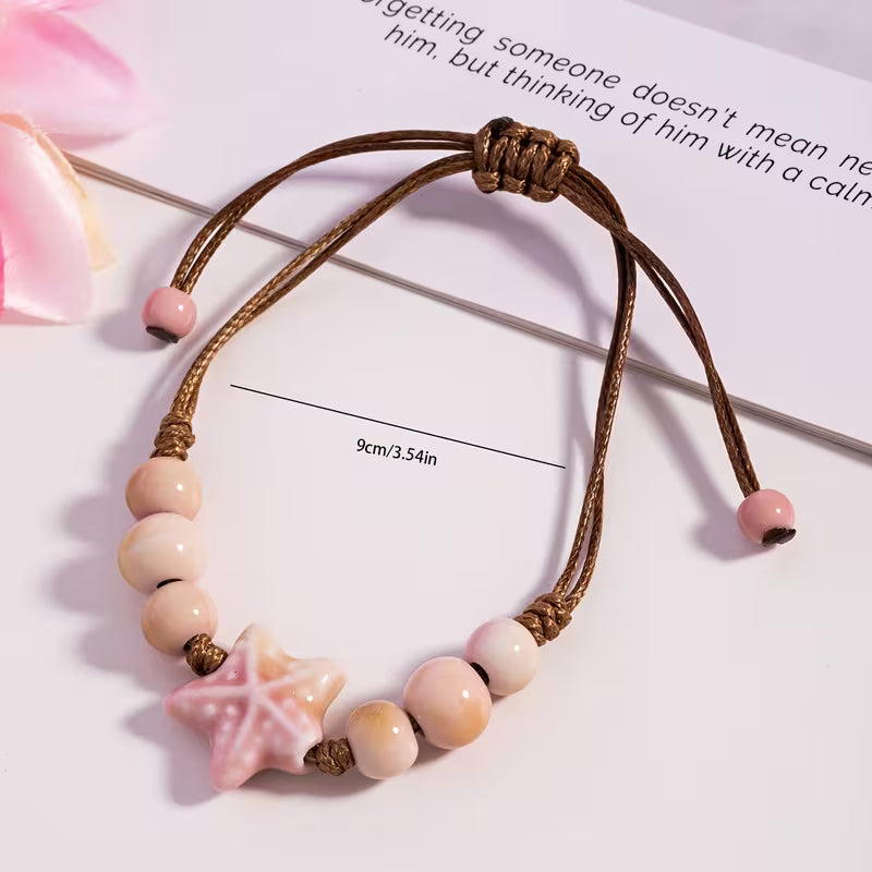 Pulseira Ajustável com Estrela-do-Mar Rosa – Estilo Boho | Mar e Vida