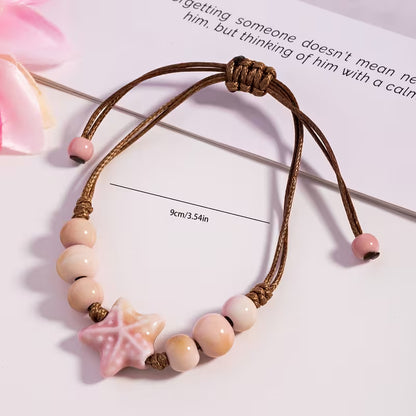 Pulseira Ajustável com Estrela-do-Mar Rosa – Estilo Boho | Mar e Vida