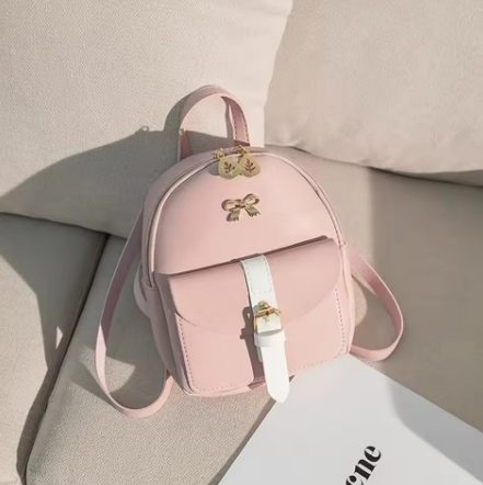 Petit sac à dos rose avec nœud